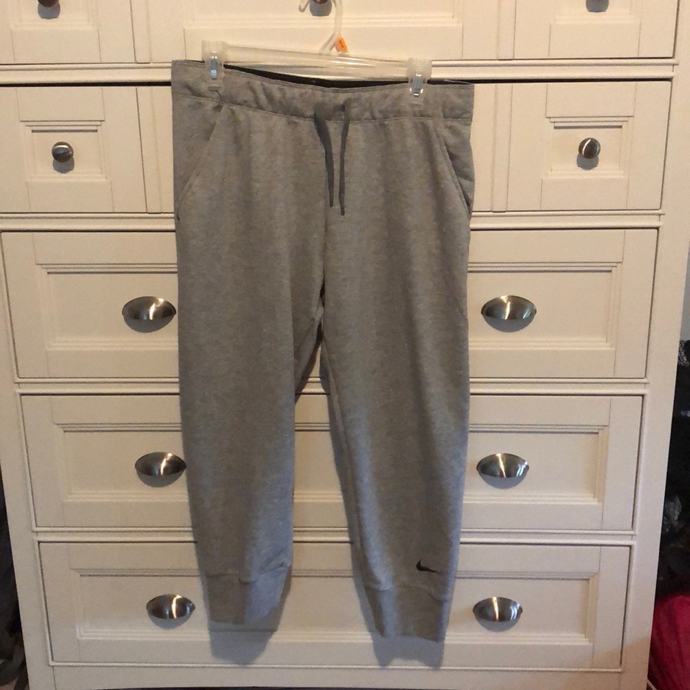 grey cropped Nike sweatpants